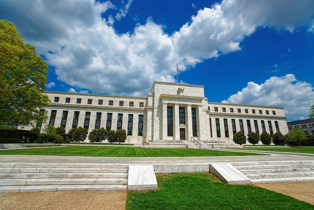 Fed Hints at Sooner-Than-Expected Reduction in Bond-Buying Program