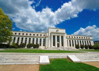 Fed Hints at Sooner-Than-Expected Reduction in Bond-Buying Program