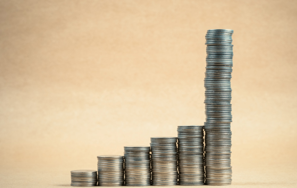 The stacks of coins illustrate the compound interest.