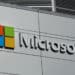 Microsoft Downgrades Earnings Outlook as Greenback Strengthens
